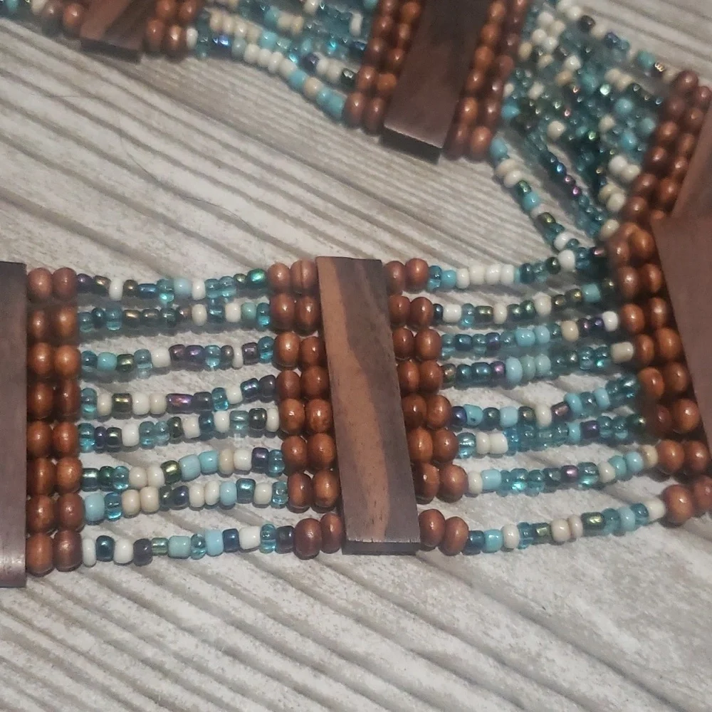 Stretch blue beaded stretch hook closure belt